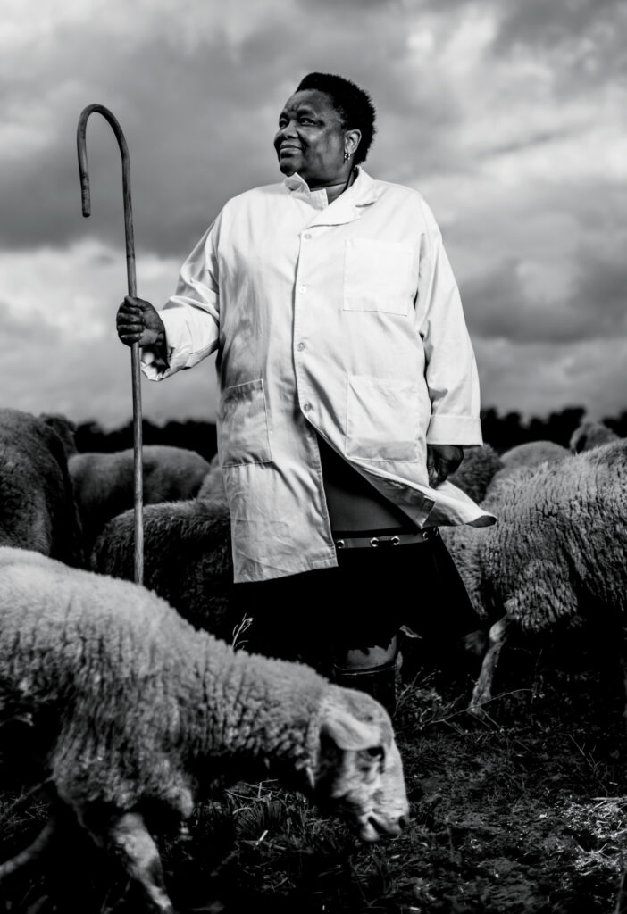 Photo of Tebello with sheep.