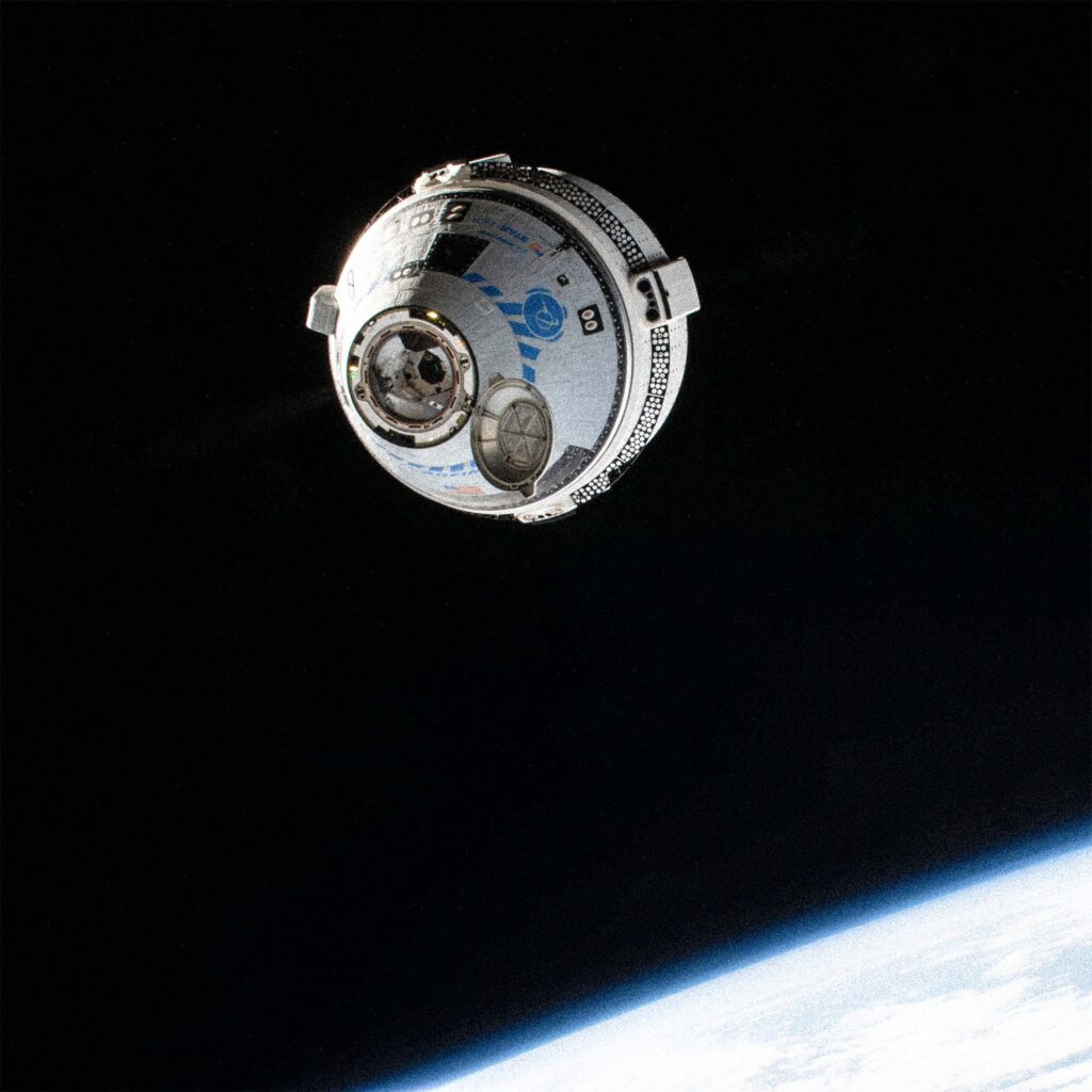 Photo of Boeing’s Starliner crew ship approaches the International Space Station, May 20, 2022.